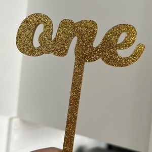 Sparkly Gold “One” first birthday Cake Topper